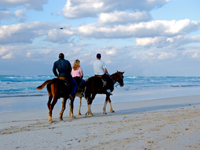 Riding Horseback on the Beach